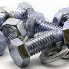 A stock image of silver nuts and bolts in a pile